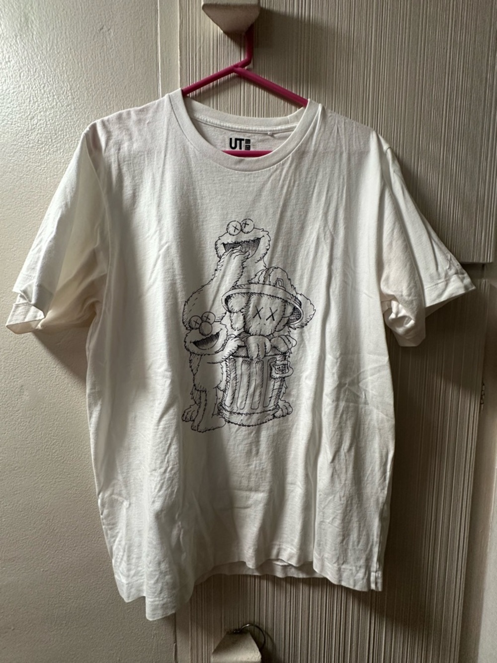 KAWS White Short Sleeve Tee with Black Line-Art Character Print